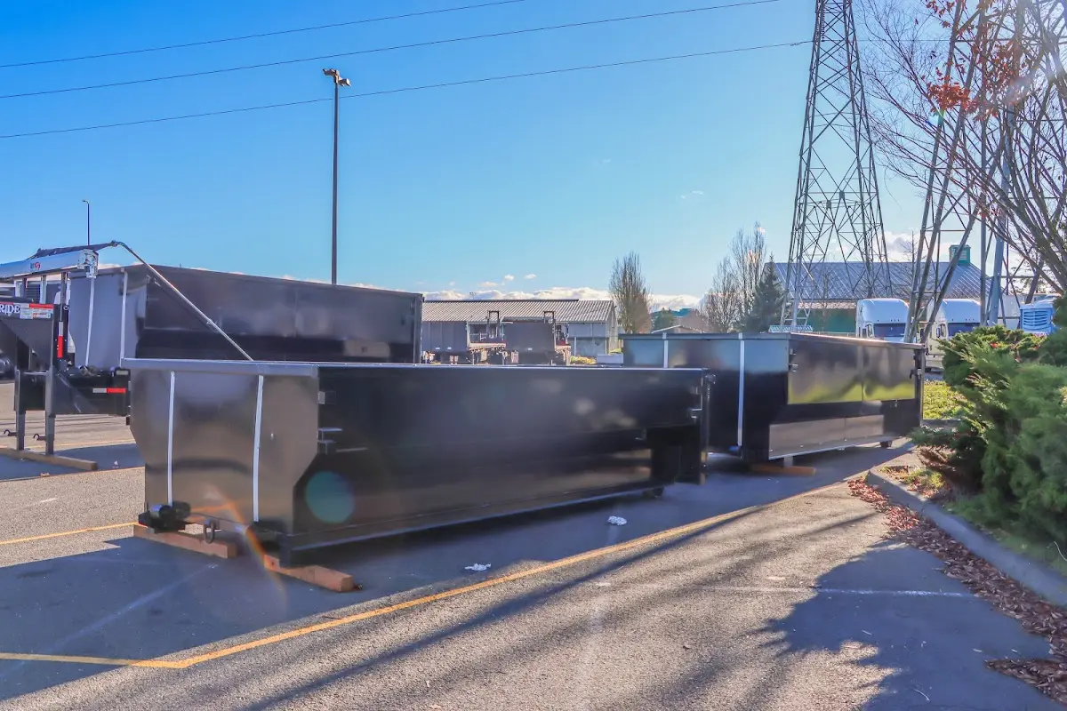 Roll-off dumpster ready for waste disposal at job site for Commercial Dumpster Rental in Milan